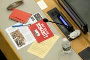 Leaflets are seen on a delegates desk before a vote by the conference to adopt a legally binding instrument to prohibit nuclear weapons, leading towards their total elimination, Friday, July 7, 2017 at United Nations headquarters. (AP Photo/Mary Altaffer)
