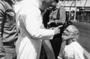 Daniel Ortega flanks Pope John Paul II who wags his finger at culture minister and priest Ernesto Cardenal, during welcoming ceremonies at the airport in Managua, Nicaragua, in March 1983. (AP Photo/Barricada, File)