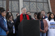 Cardinal Blase Cupich and young members of Immaculate Conception Catholic Church in Chicago spoke out against gun violence during a Good Friday peace walk on March 30. (Photo: Archdiocese of Chicago.)