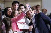 Republican presidential candidate, Sen. Marco Rubio, R-Fla., poses for a photograph at a campaign rally in Boise, Idaho, Sunday, March 6, 2016. (AP Photo/Paul Sancya)