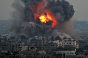 Smoke rises after an an Israeli airstrike in Gaza City on July 8.
