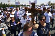 Hundreds of Iraqi Christians marched to the United Nations office in Irbil on July 24, calling for help for families who fled in the face of threats by Islamic State militants.