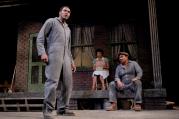 Carl Lumbly as Troy Maxson (foreground), with Margo Hall as Rose and Steven Anthony Jones as Jim Bono (background), in August Wilson's Fences (Photo: Ed Smith).