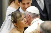 Pope Francis greets newly married couples during his weekly audience in Paul VI hall at the Vatican Aug. 5. (CNS photo/Giampiero Sposito, Reuters) 