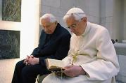 Pope Benedict XVI prays with his brother, Msgr. Georg Ratzinger in his private chapel at the Vatican April 14. (CNS photo/L'Osservatore Romano via Reuters) (April 14, 2012)