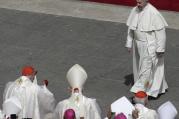 Pope Francis walks towards cardinals at the end of a Mass for the the Holy Year of Mercy, in St. Peter's Square at the Vatican, Sunday, April 3, 2016. (AP Photo/Alessandra Tarantino)
