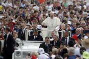 Pope Francis waves to faithful as he is driven through the crowd ahead of his weekly general audience, in St. Peter's Square, at the Vatican, Wednesday, Aug. 31, 2016. (AP Photo/Andrew Medichini)