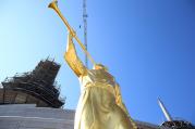 A gold-leaf statue depicting the ancient Mormon prophet, Moroni, is prepared for placement on one of the spires of the new Mormon temple in Rome on March 25, 2017. Photo courtesy of Claudio Falanga/Intellectual Reserve Inc.