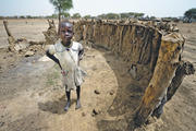 Poverty and Conflict: A child in Abyei, Sudan. Most of the world's 400 million children in extreme poverty live in Africa.