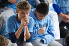 Campers pray the rosary July 24 during Mike Sweeney Catholic Baseball Camp at the Russell Road Sports Complex in Kent, Wash. (CNS photo/Stephen Brashear) 