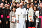 Pope Francis poses for a photo on Sept. 18 with members of a U.S. delegation that traveled to Rome to present the results of the Fifth National Encuentro to the pope and top Vatican officials. 