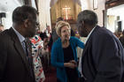 Democratic presidential candidate Sen. Elizabeth Warren, D-Mass., shakes hands with Alabama State Sen. Henry Sanders at the Brown Chapel AME Church in Selma, Ala., on March 19. (Jake Crandall/The Montgomery Advertiser via AP)