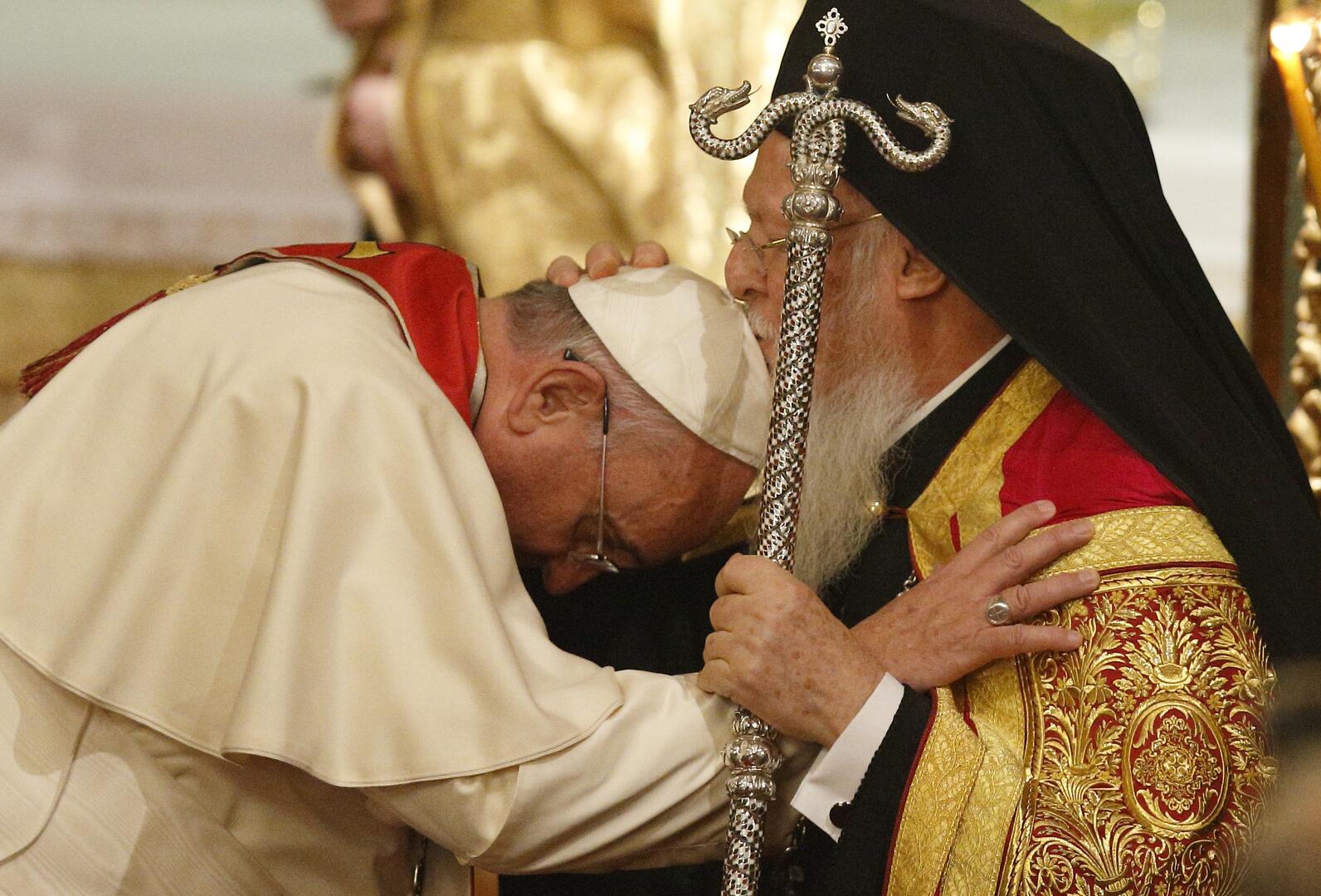 Ecumenical Patriarch Bartholomew kisses Pope Francis' head