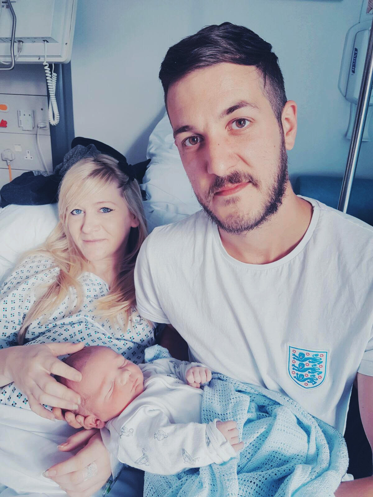 Charlie Gard and his parents.