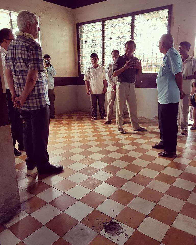 Arturo Sosa stands where Richie Fernando was killed. A dent is still visible on the floor where the grenade fell.