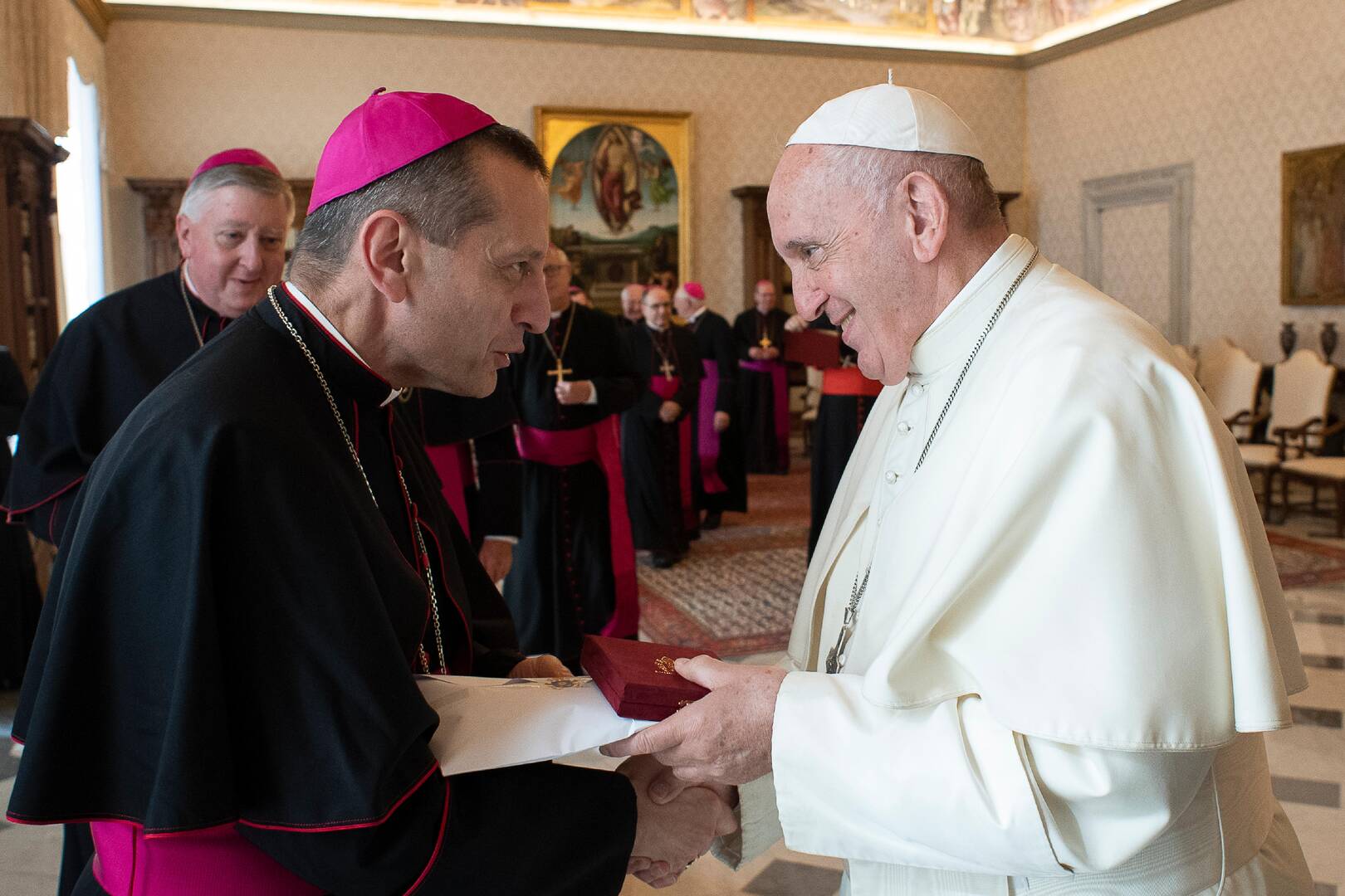 Pope Francis greets Bishop Frank J. Caggiano of Bridgeport, Conn., during a meeting with U.S. bishops from the New England States at the Vatican Nov. 7, 2019. The bishops were making their "ad limina" visits to the Vatican to report on the status of their dioceses to the pope and Vatican officials. (CNS photo/Vatican Media)