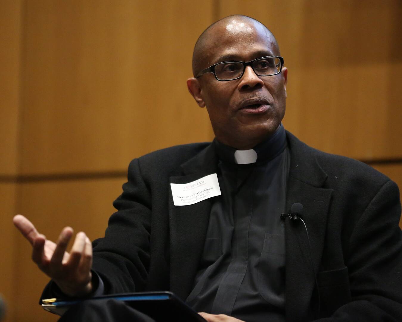 The Rev. Bryan Massingale, a theology professor at Fordham University in New York, speaks during a 2017 panel discussion in New York in 2017. (CNS photo/Bruce Gilbert, Fordham University)