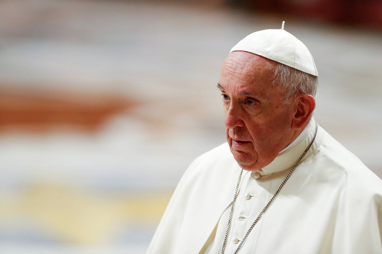 Pope Francis leaves at the conclusion of an evening prayer service in St. Peter’s Basilica at the Vatican on Dec. 31, 2021. (CNS photo/Remo Casilli, Reuters)