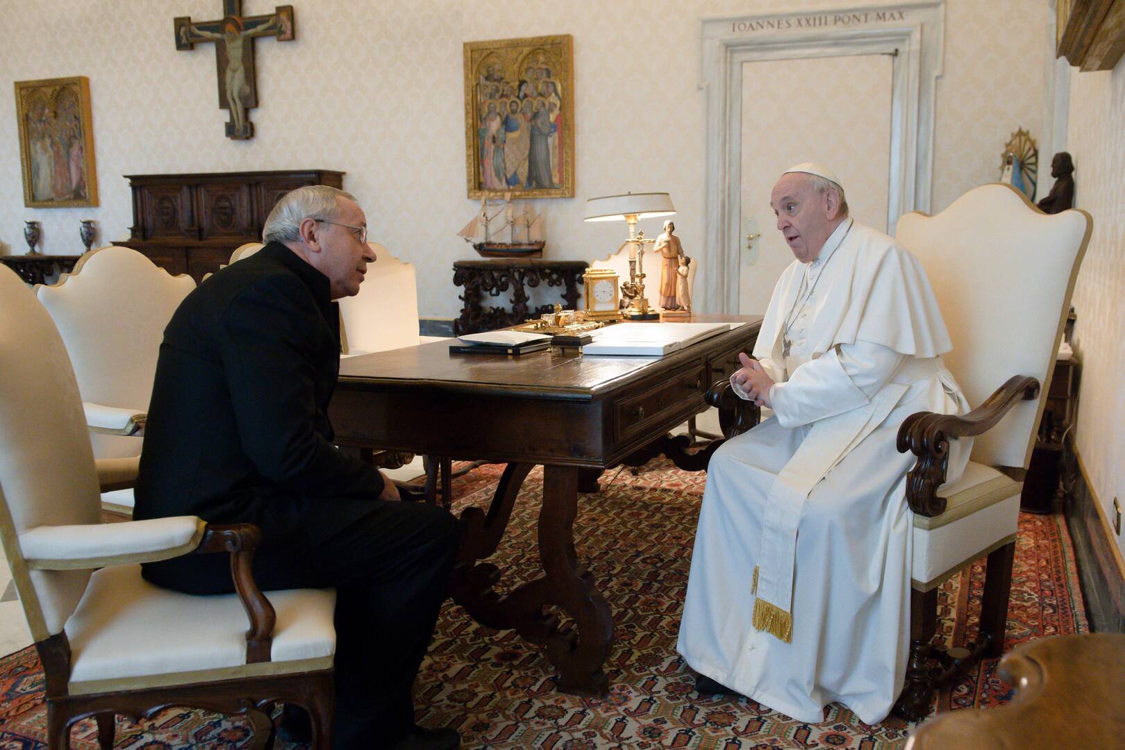 Pope Francis greets Jesuit Father Marko Rupnik during a private audience at the Vatican in this Jan. 3, 2022. (CNS photo/Vatican Media)