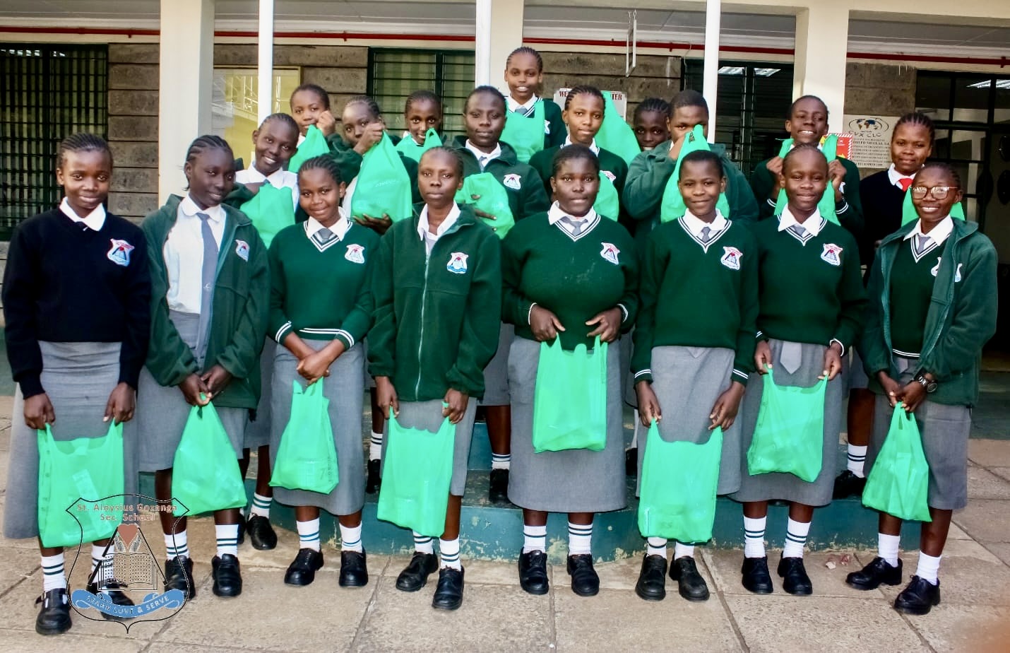 Students at St. Aloysius Secondary School receiving hygiene kits.