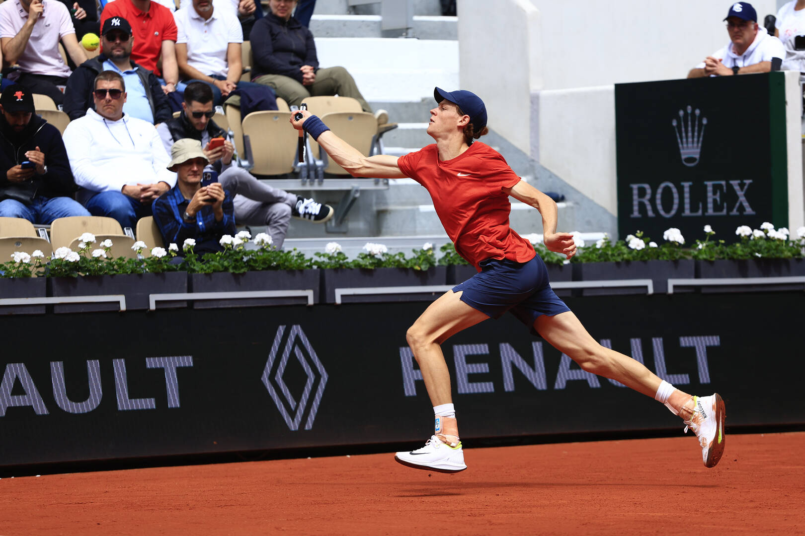 Italy's Jannik Sinner runs to play a shot against Christopher Eubanks of the U.S. during their first round match of the French Open tennis tournament at the Roland Garros stadium in Paris, Monday, May 27, 2024. (AP Photo/Aurelien Morissard)