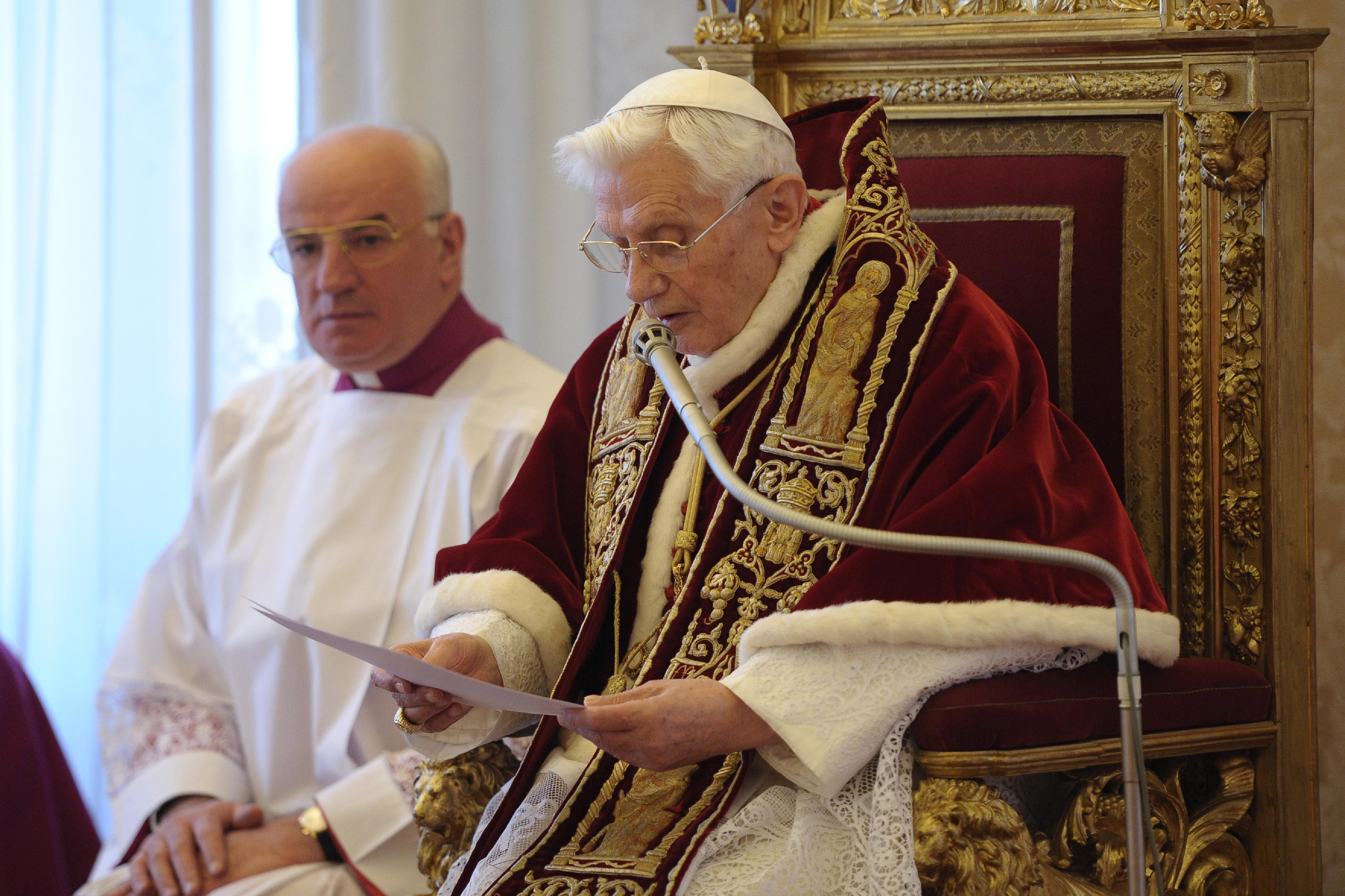 Benedict XVI Reads Resignation: Pope Benedict XVI reads his resignation in Latin during a meeting of cardinals at the Vatican in this Feb. 11, 2013, file photo. There were no media members in attendance. (CNS photo/L'Osservatore Romano) (Feb. 13, 2014)