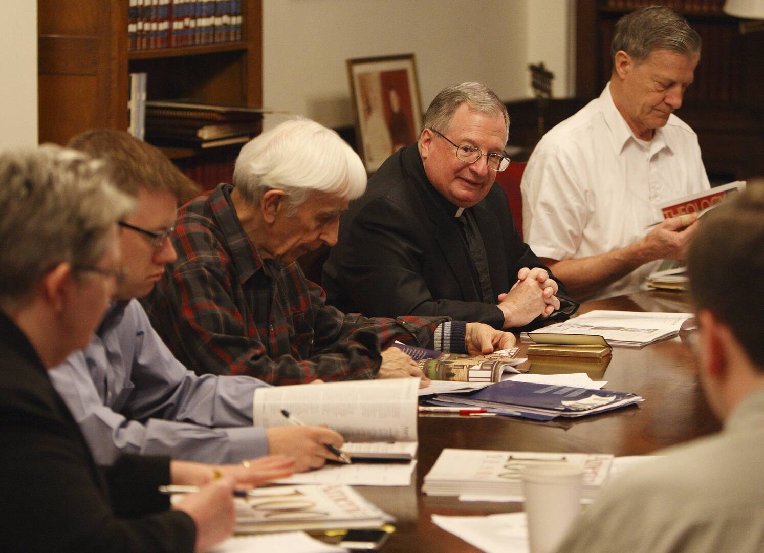 Drew Christiansen, S.J., leading an editorial meeting at America in 2009 (CNS photo/Paul Haring)