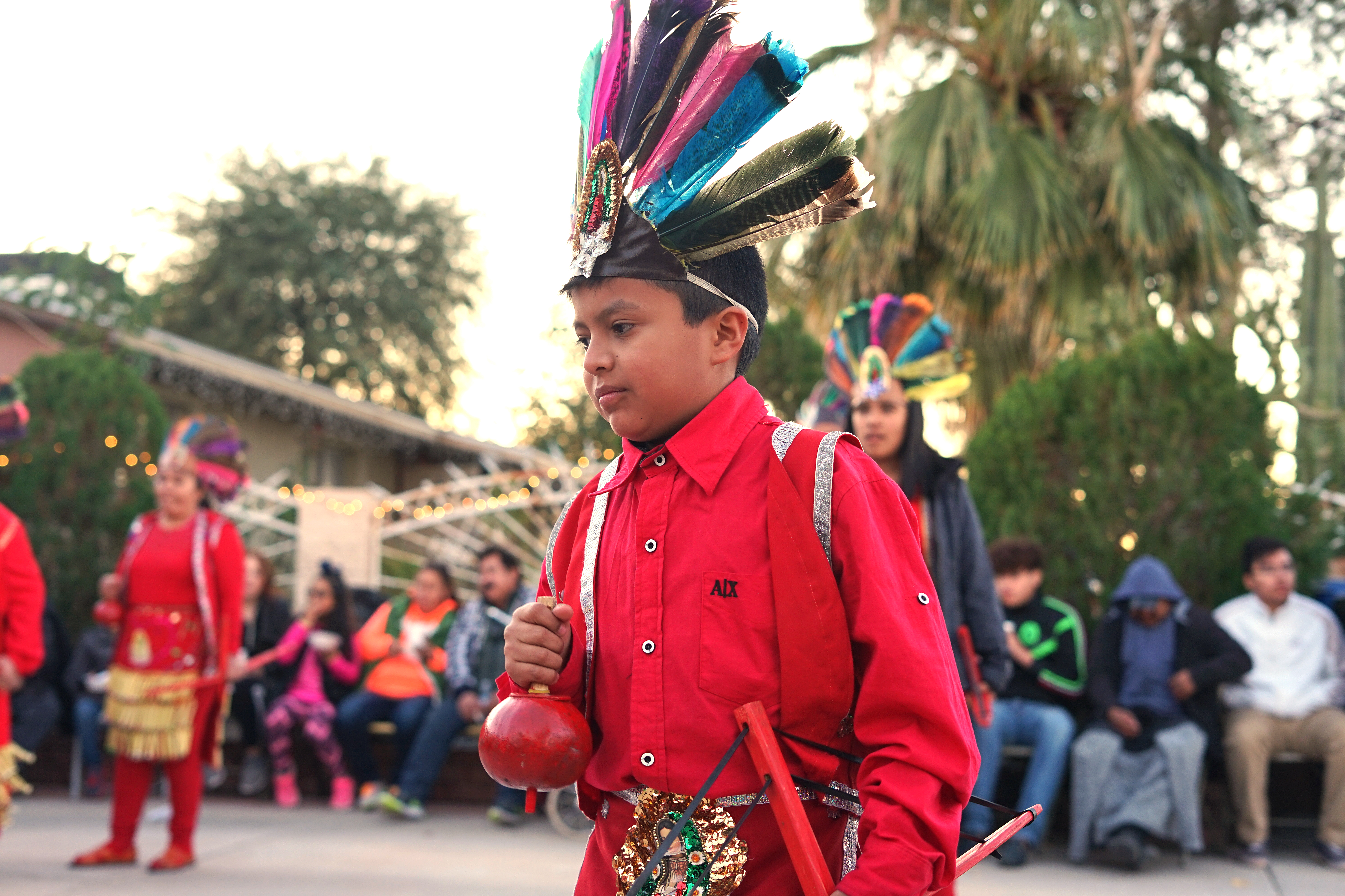 A child dressed up for Las Posadas