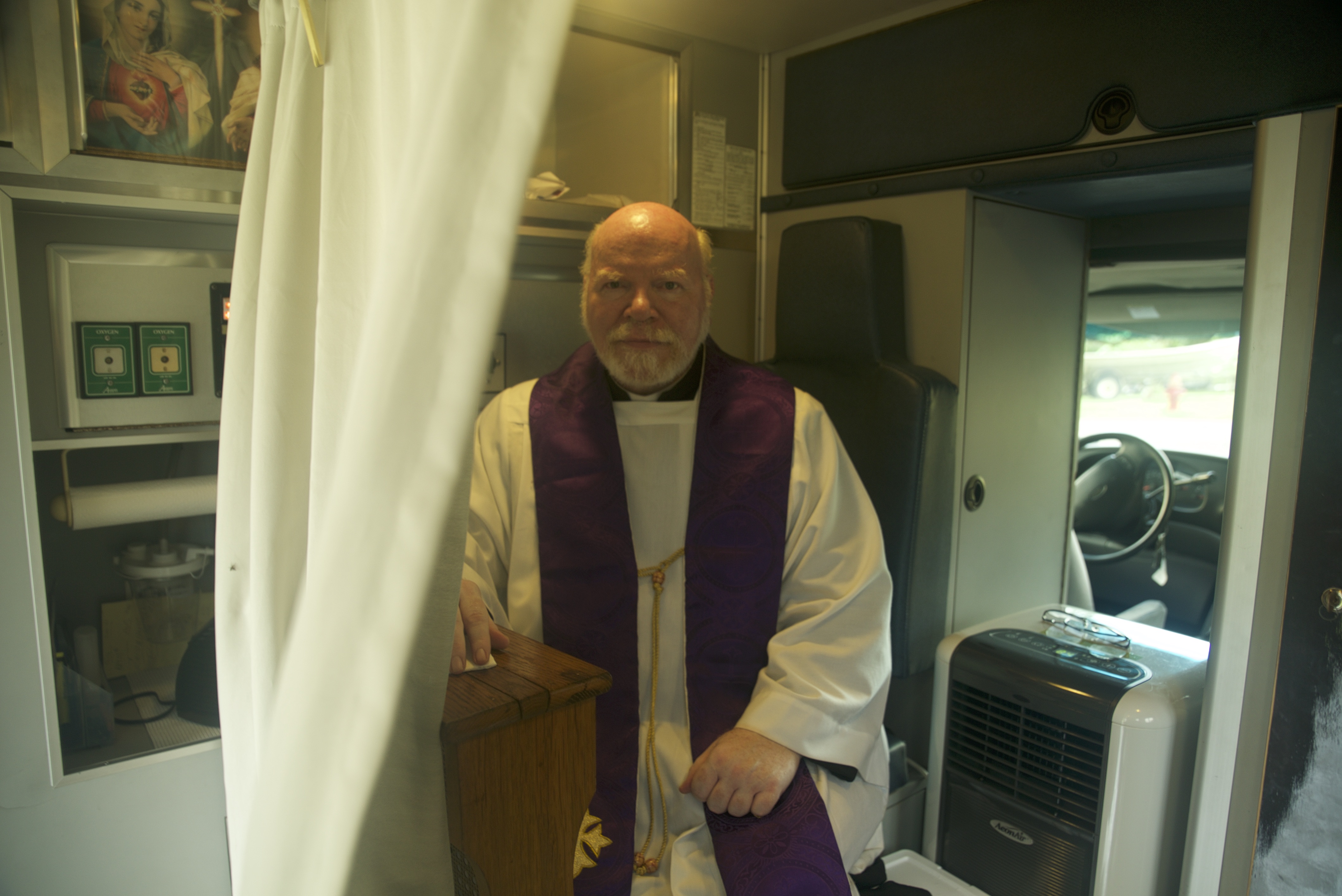The Rev. William Seifert is one of the priests who hear confessions in the Spiritual Care Unit.