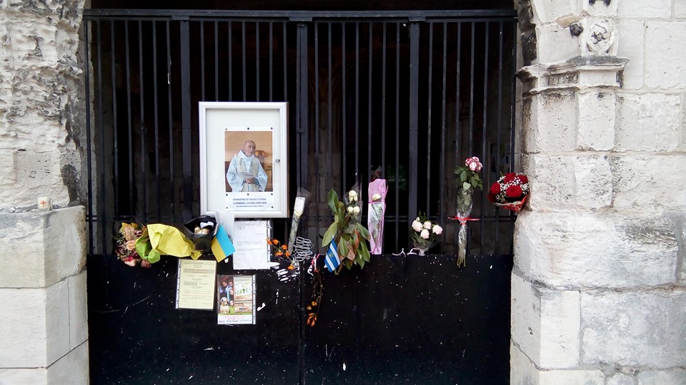 A memorial to the Rev. Jacques Hamel two months after his death in St.-Étienne-du-Rouvray, France. (Nicholas Zinos)