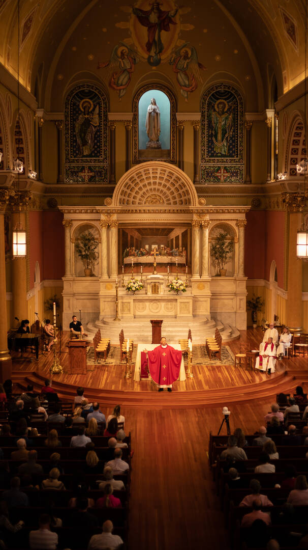 The Rev. John Unni, pastor of St. Cecilia Church in Boston, Mass., delivers a homily.