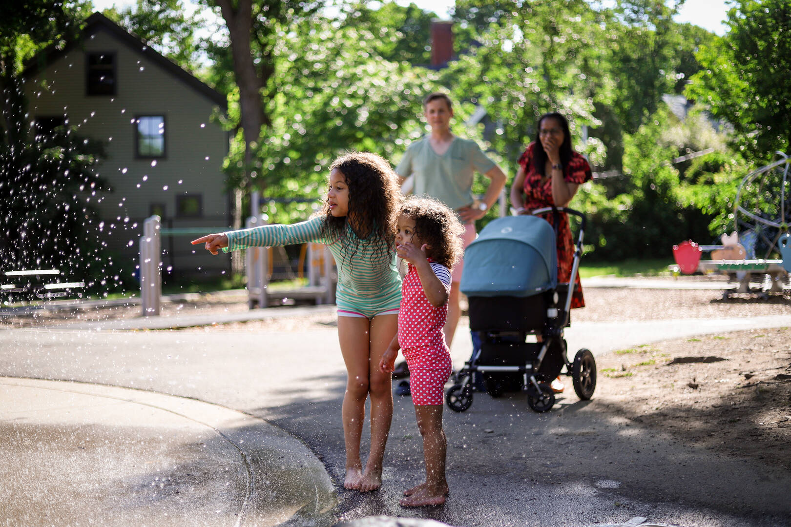 Natasha and Jan Hartman of Boston, Mass. with two of their daughters.