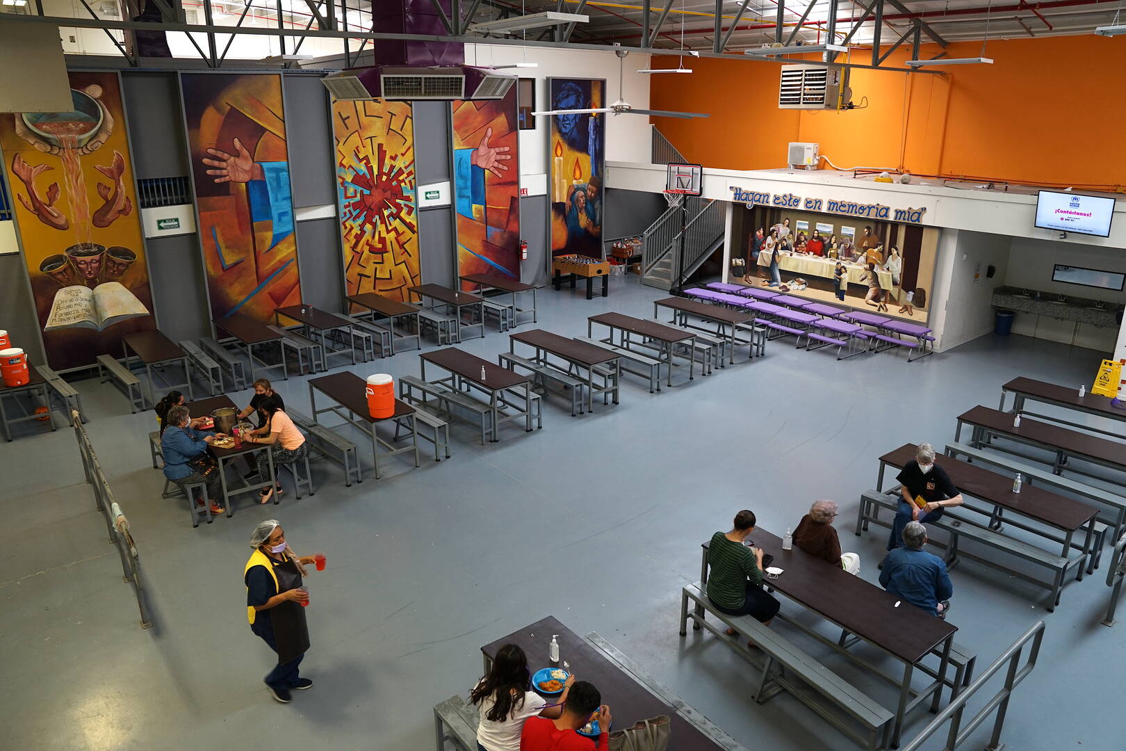 a school cafeteria set up for migrants 