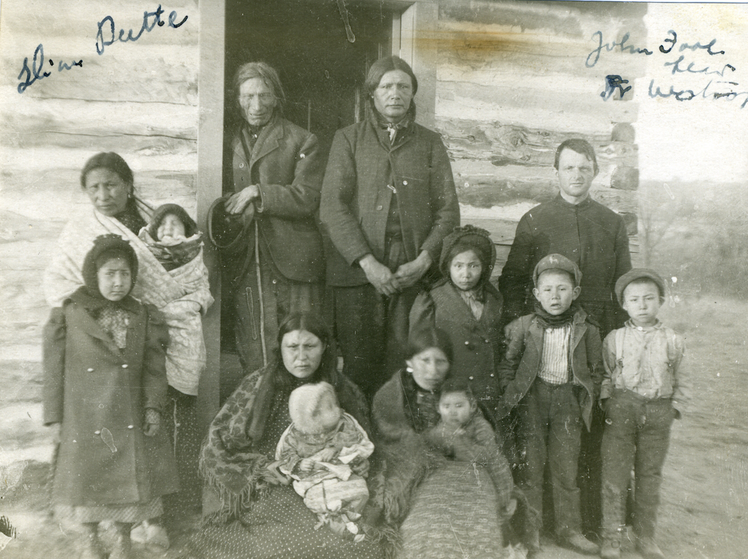 Henry Westropp, S.J., visiting John Fool Head and family, n.d., 1890-1920, Slim Buttes, S. Dak.