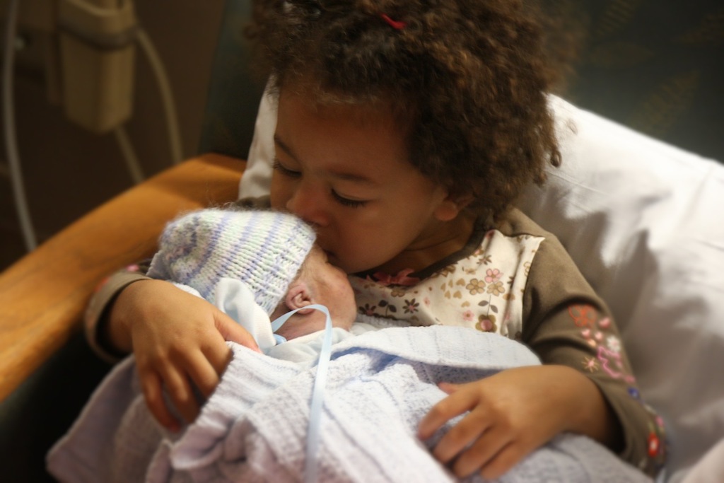 Xavier Jean Kiemde was born on Sept. 13, 2012. He lived for one hour outside of his mother’s body, but was held by his sister.