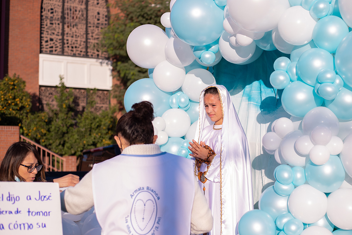 A young girl dressed as Our Lady of Guadalupe for the Honor Your Mother festival in Phoenix, Ariz. on December 4, 2021.