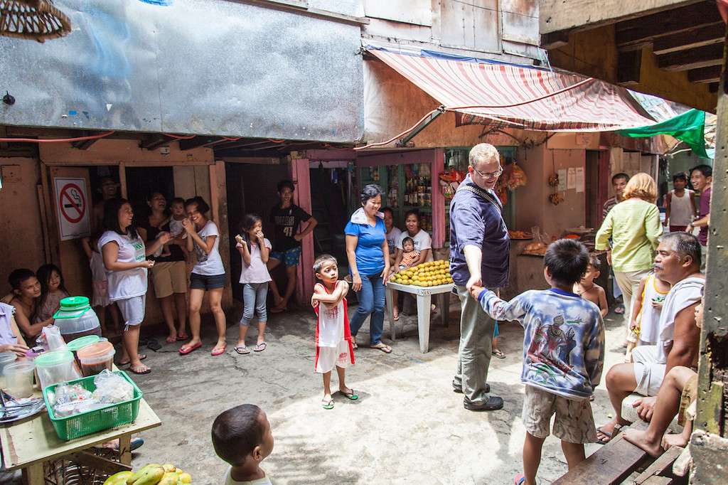 Phil Cooke, S.J., visits social enterprises in the Philippines, where he led GSBI Boosts with Miller Center for Social Entrepreneurship. (Courtesy of Miller Center for Social Entrepreneurship)