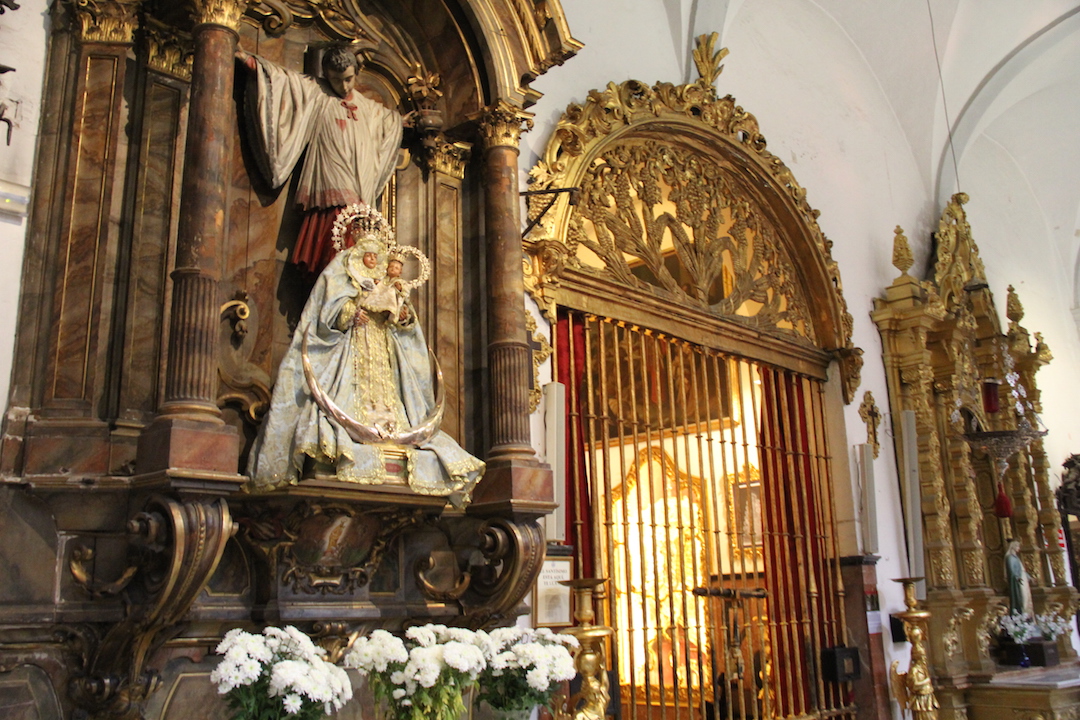 Inside the Parroquia de San Nicolás de Bari in Seville, a sign near this altar once identified the crucified boy as Dominguito del Val, a figure alleged to have been murdered by Seville’s Jews. This death—real or imagined—served as a pretext for a pogrom. (Photo: Nachama Soloveichik)