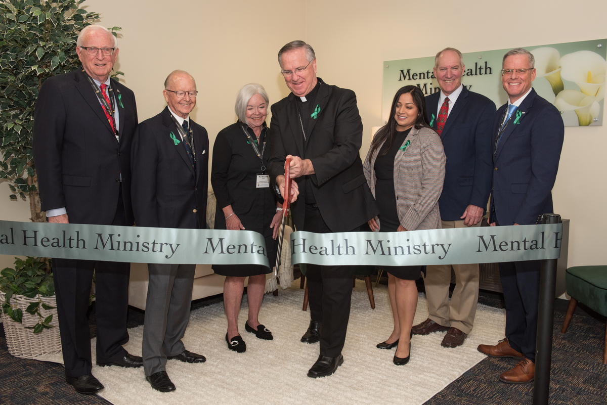 Bishop Dolan at ribbon cutting for mental health office