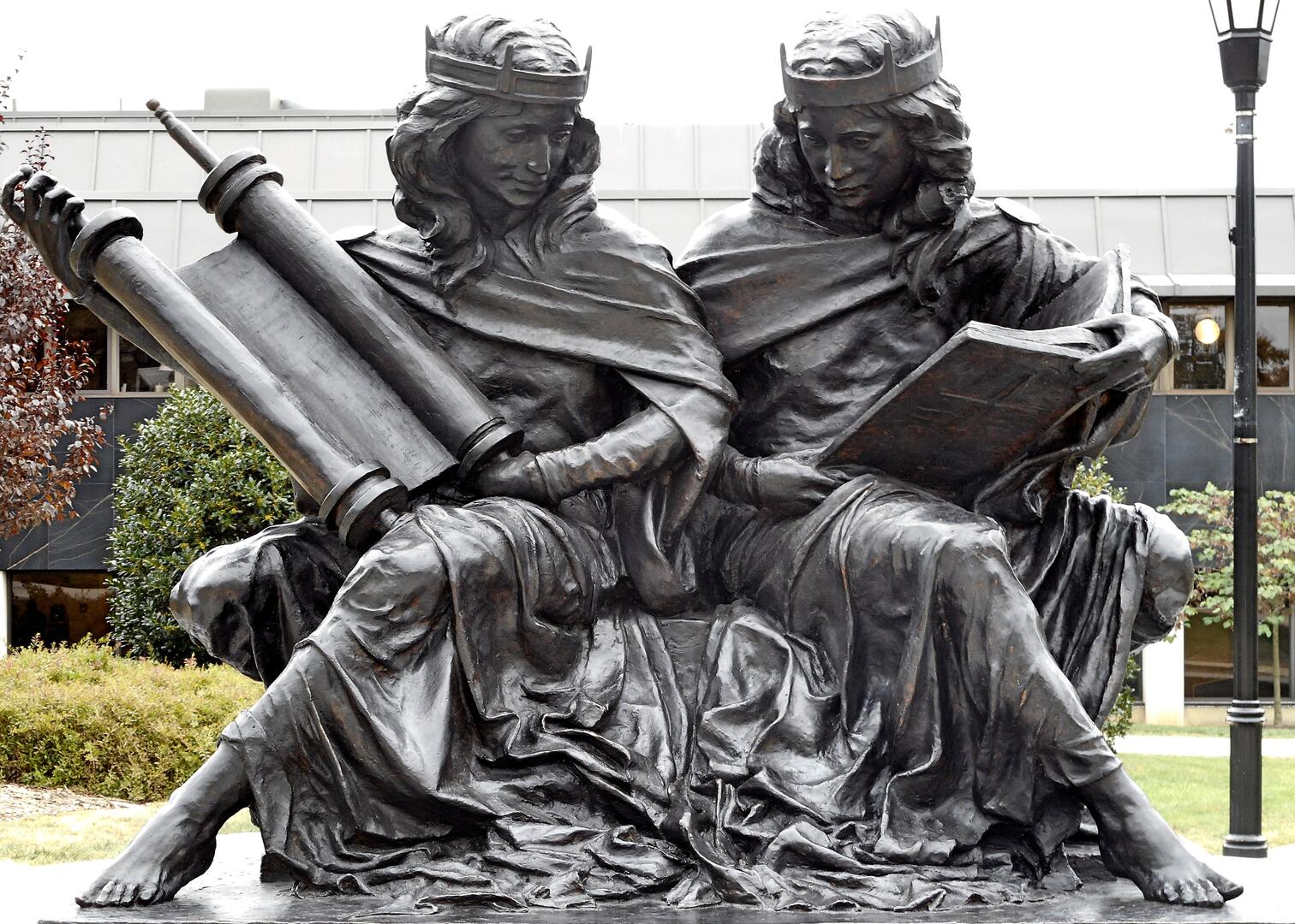 The "Synagoga and Ecclesia in Our Time" sculpture by Joshua Koffman is seen on the campus of St. Joseph's University in Philadelphia. The sculpture shows Synagoga (Synagogue) and Ecclesia (Church) studying their sacred texts together. Pope Francis prayed at and blessed the sculpture during his 2015 visit. (CNS photo/courtesy St. Joseph's University)