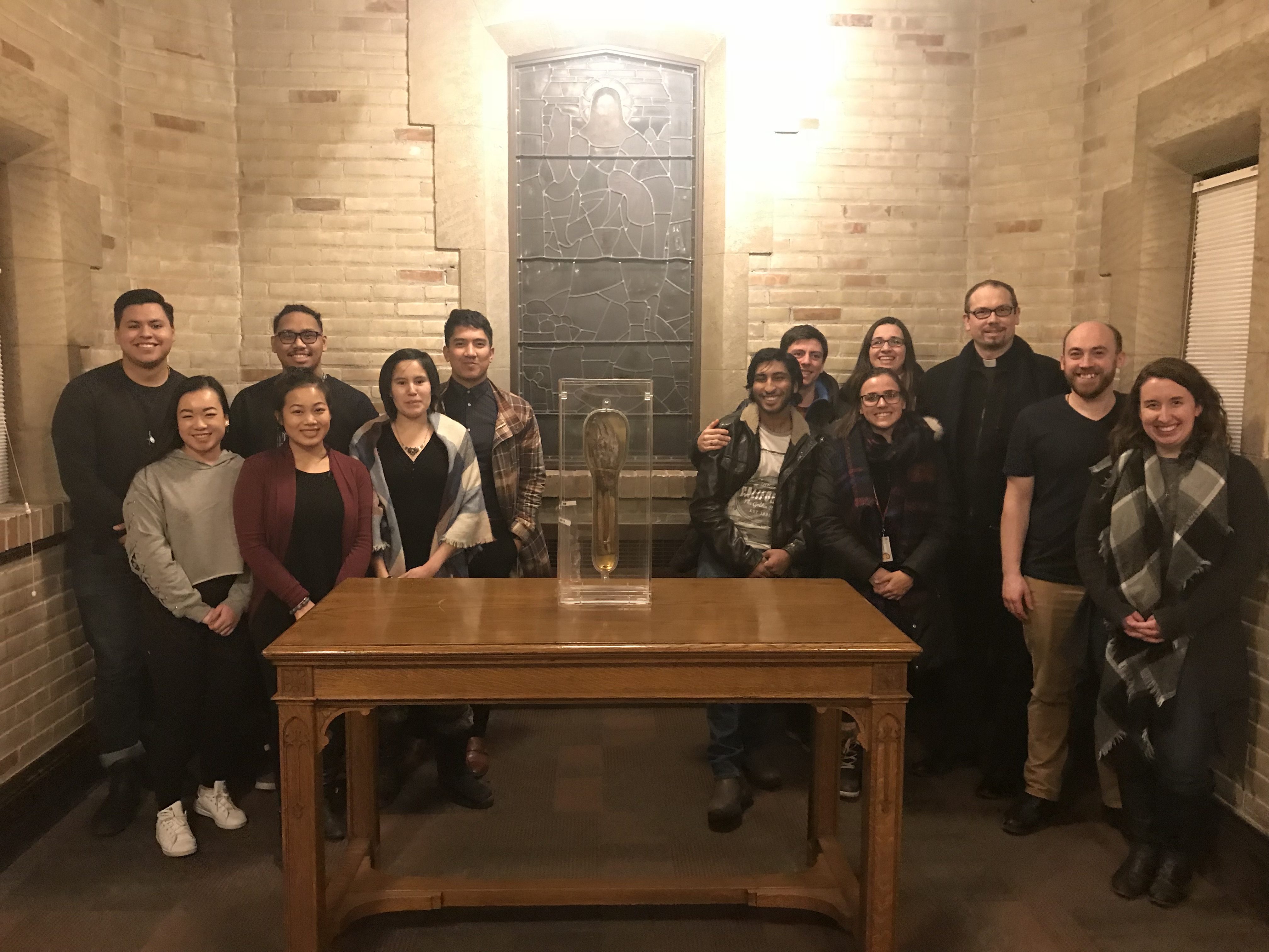 Students with the relic in Winnipeg. Credit: John O’Brien, S.J.