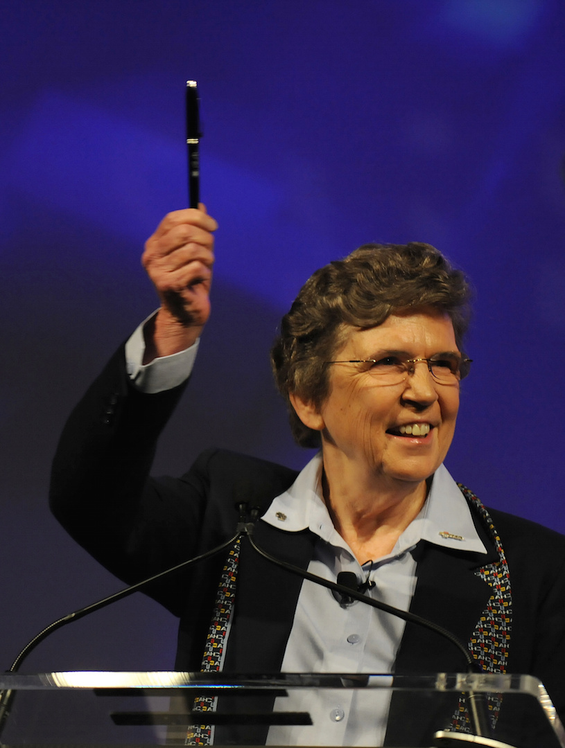 Sister Carol Keehan holds up one of 20 pens used by U.S. President Barack Obama to sign the health care reform bill into law. (CNS photo/Matt McClain, courtesy Catholic Health Association)