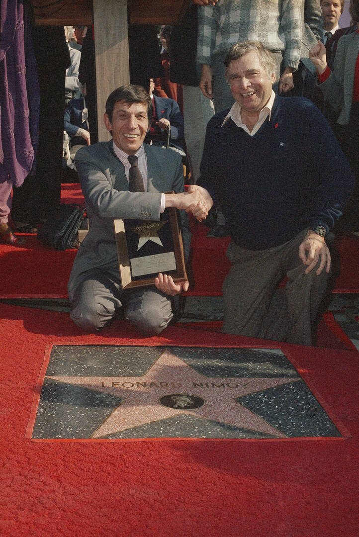 Leonard Nimoy shakes hands with “Star Trek” creator Gene Roddenberry at the unveiling of Nimoy’s star on the Hollywood Walk of Fame on Jan. 16, 1985 (AP Photo/Wally Fong).