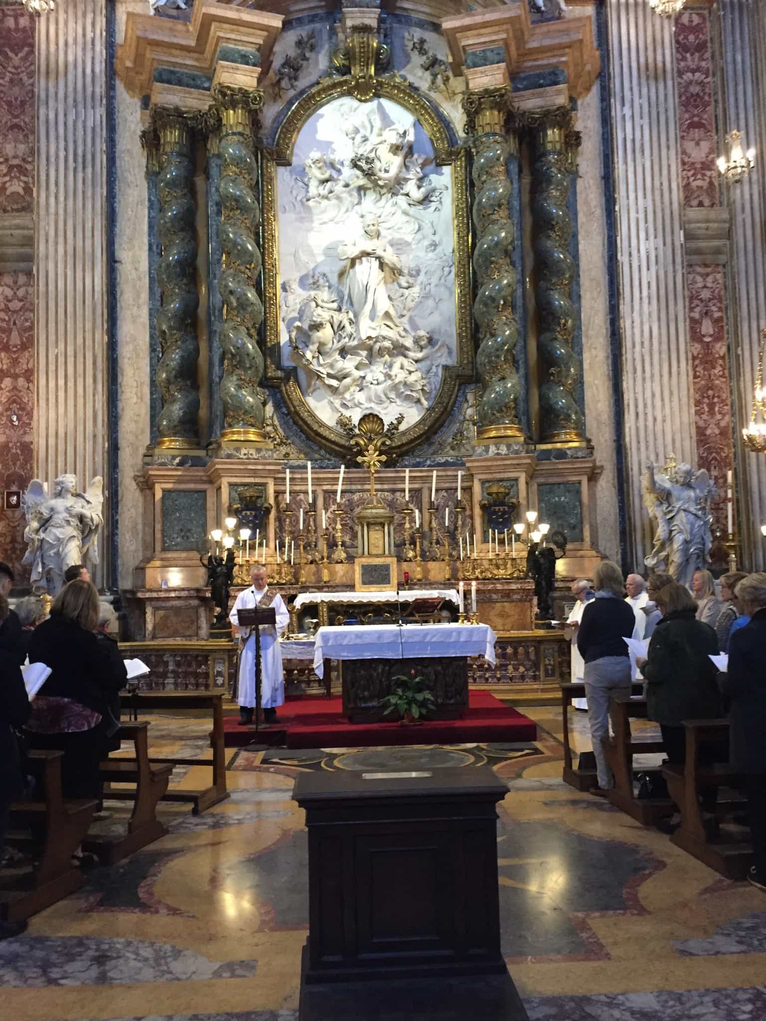 Tom Kolon serves as deacon at Mass in St. Ignatius Church