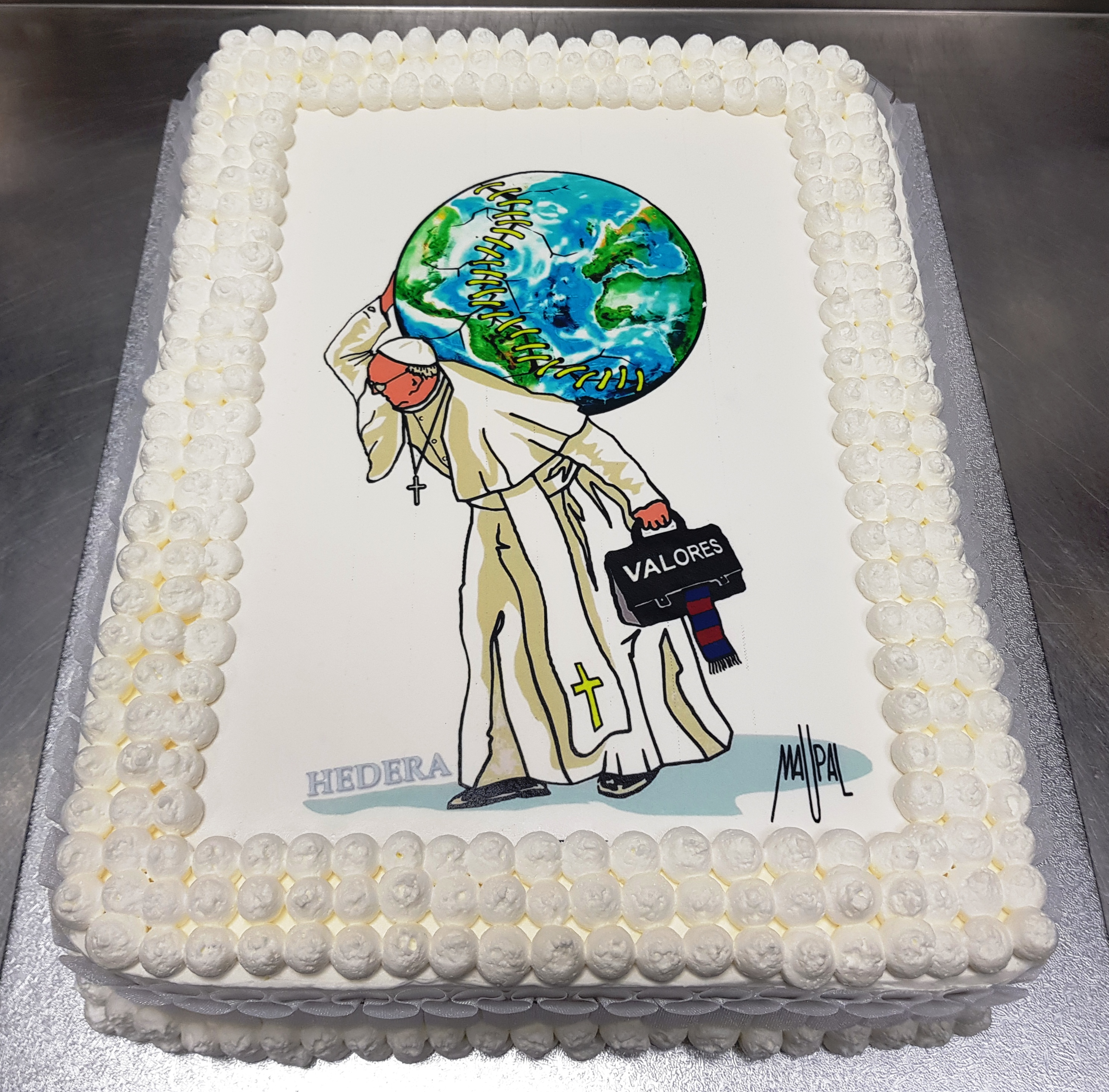 A birthday cake made by Hedera, a baker near the Vatican, with a design by the famous Roman street artist, Maupal