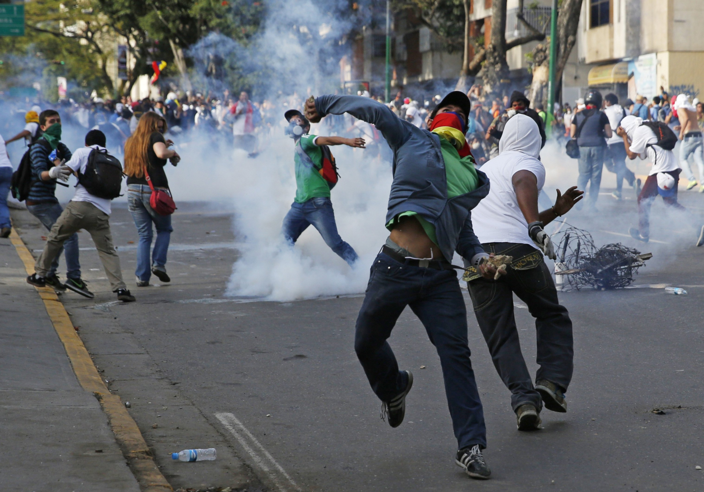 Гражданское нападение. Протестующий человек. Сан Кристобаль протесты 2014.