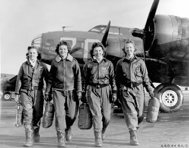 Four female pilots, part of the WWII-era Women Airforce Service Pilots program (WASP), in front of a B-17 Flying Fortress. (US Air Force photo) 