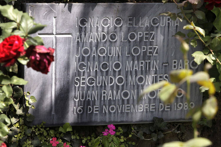 Stone bearing the names of the six Jesuits killed in San Salvador in 1989.