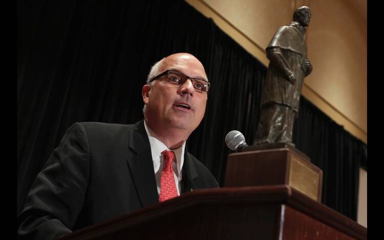 Tony Spence receiving the St. Francis de Sales award in 2010 from the Catholic Press Association, the association's highest honor. (CNS/Nancy Wiechec)