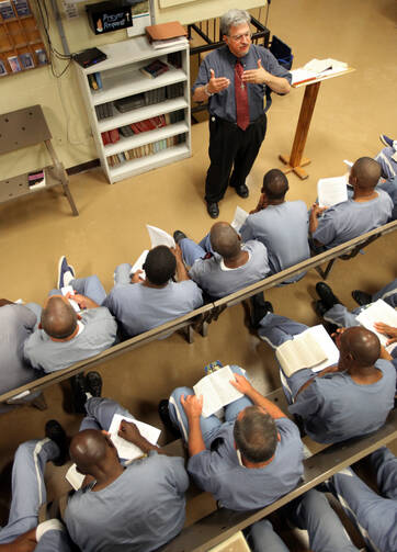 Chaplain religious education instruction to inmates in a Florida prison. (CNS photo/Daron Dean) 